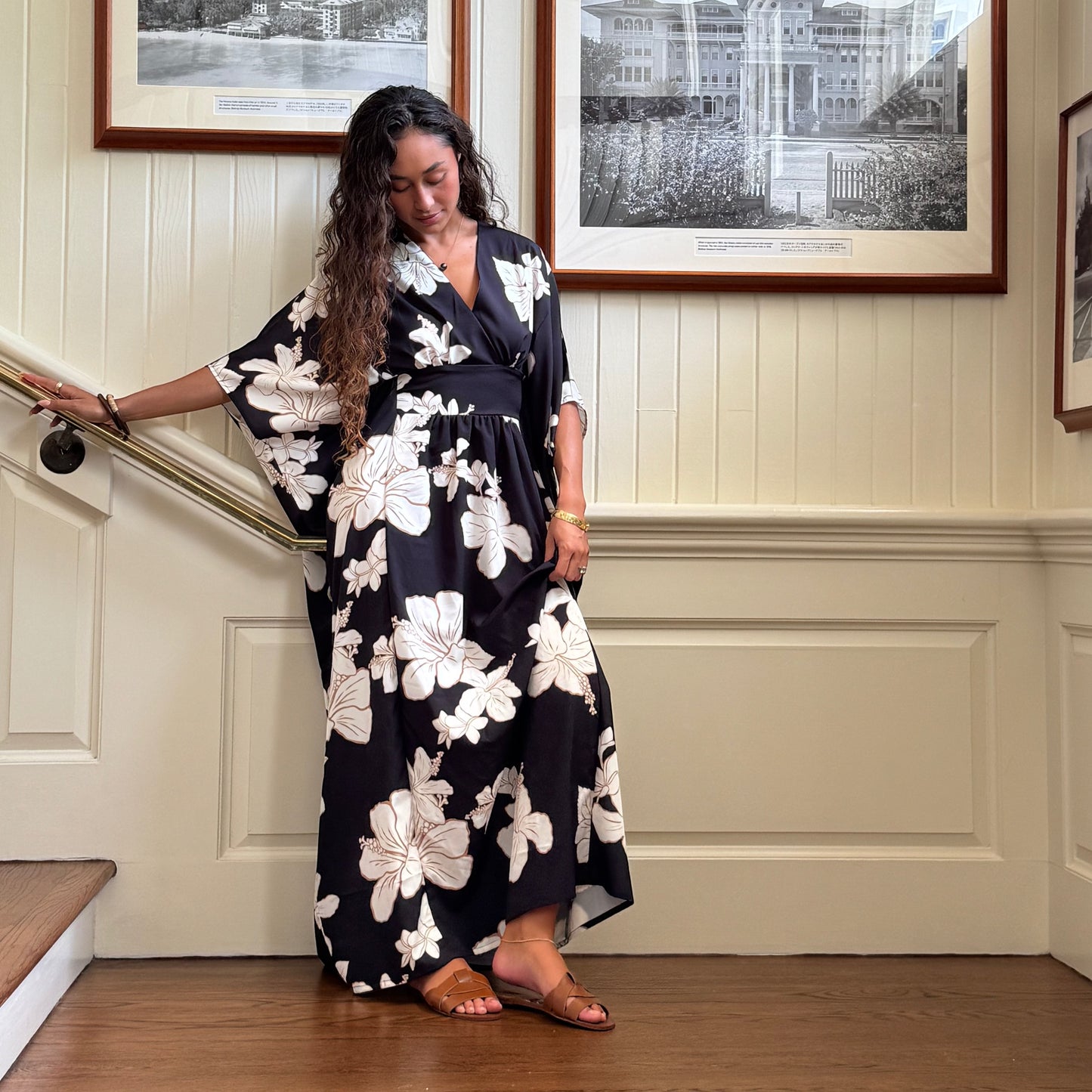 Guava Jammies black floral print island gown with v-neck and flowing sleeves, made from recycled polyester.