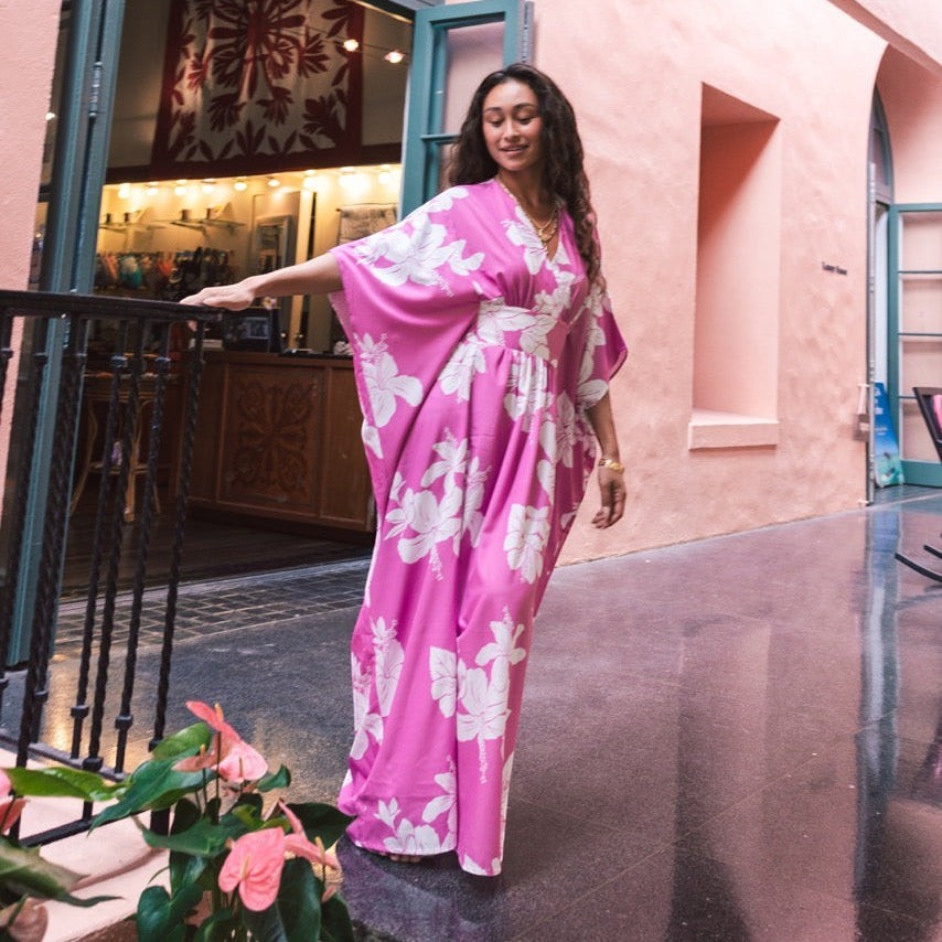 Guava Jammies pink floral print island gown with v-neck and cinched waist. Made from recycled polyester.